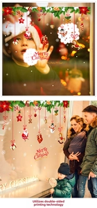 Close-up of double-sided Christmas window stickers with Santa and reindeer designs