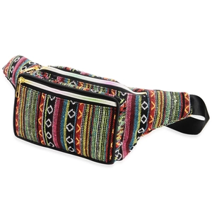Detail showing woven bohemian fabric texture with colorful stripes and gold zippers