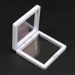 Detail view of white square PE film 3D floating display box for jewelry storage