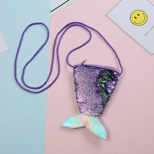 Detail of fishtail sequin coin purse with purple strap and reversible color scale texture