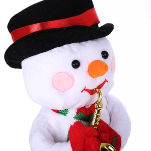 Close-up of a plush musical snowman toy with a black top hat and golden saxophone