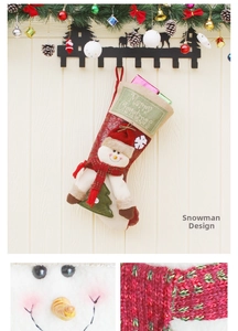 Detail of sequin Christmas stocking with a plush snowman and Merry Christmas embroidery