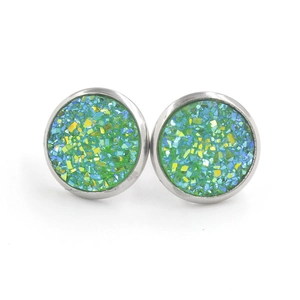 Close-up of 12mm stainless steel stud earrings with blue and green glitter inlay