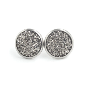 Macro shot of 12mm stainless steel stud earrings with silver druzy crystal centers