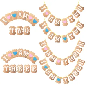 Detail view of I AM TWO and I AM THREE kraft paper banners for children birthday parties
