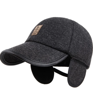 Winter wool baseball cap for men with warm ear flaps and stylish leather trim details