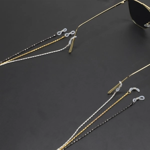 Metallic eyewear chain straps in gold, silver, and black with non-slip silicone loops