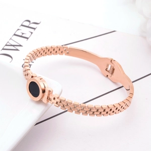 Bracelet jonc en acier inoxydable rose doré avec chiffres romains et disque noir poli