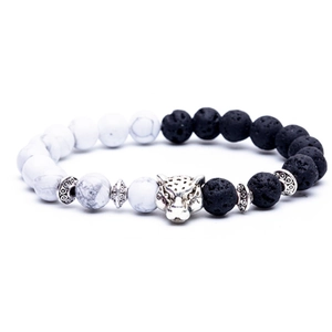 Lava rock and white turquoise beaded bracelet with silver leopard head charm