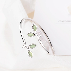 Minimalist sprout leaf open bangle with light green opal stone in silver finish