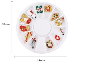 Detail of a 12-grid nail art kit with Christmas charms and rhinestones in a white wheel case