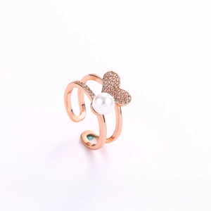 Double-layered rose gold heart ring with white pearl and pave cubic zirconia accents