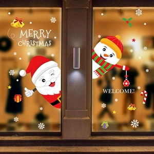 Festive Christmas window stickers featuring Santa, snowman, and Merry Christmas text