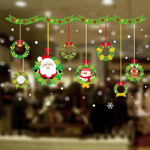 Christmas wreath window decals featuring Santa, snowman and reindeer for glass door decor
