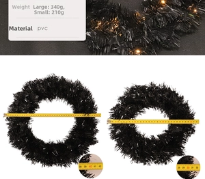 Detail view of black PVC decorative wreath in two sizes with warm LED lights
