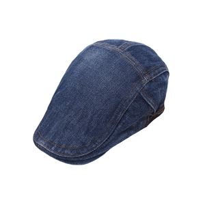 Classic dark blue washed denim ivy cap with contrast brown stitching for casual style
