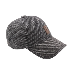 Men's winter wool blend baseball cap with warm ear flaps and grey tweed texture