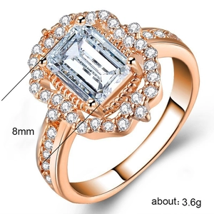 Rose gold square zircon ring with 8mm emerald cut main stone and paved accent diamonds