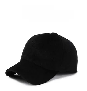 Detail of black faux fur winter baseball cap with plush texture and SPORT embroidery