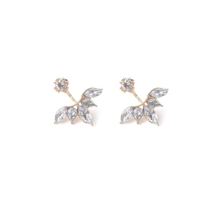 Elegant gold leaf marquise zirconia stud earrings with silver needle on white background
