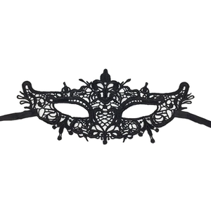 Close-up of the delicate black lace texture and intricate floral pattern on the masquerade mask