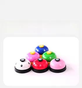 Detailed set of metal pet training bells in six colors with paw print design