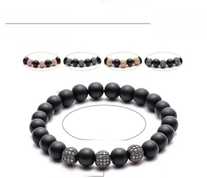 Detail of 8mm matte black stone beads bracelet with micro-pave zircon copper balls