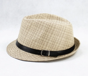 Detailed close-up of light khaki straw fedora hat featuring a black band with metal buckle