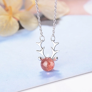 Antler pendant necklace with red strawberry crystal on silver chain for women