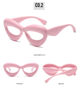 Multiple views of pink oversized cat-eye glasses frame with thick glossy finish