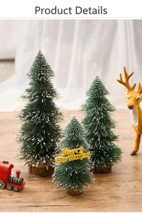 Miniature flocked cedar Christmas tree set with wooden bases and snow effect on table