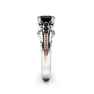Vintage style ring with square black stone and rose gold hollow filigree details