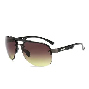Classic pilot style rimless sunglasses with gradient brown lenses and gunmetal bridge