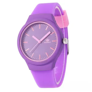 Detail shot of purple silicone watch with pink contrast markers and soft strap texture
