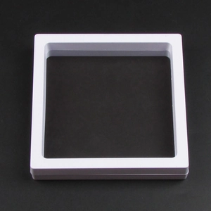 Macro view of white square PE film suspension box for jewelry and coin display