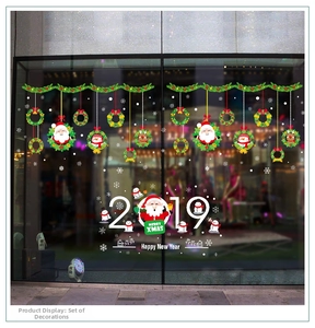 Detailed view of Christmas Santa Claus train window decals with Merry Xmas stickers