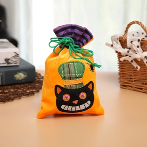 Halloween plush pumpkin candy bag with black cat embroidery and purple striped drawstring