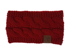 Macro detail of red cable knit headband featuring a premium brown C.C leather patch