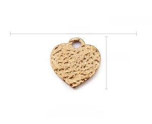 Detail of 14x15mm hammered heart pendant with 18K gold vacuum plating and 2g weight