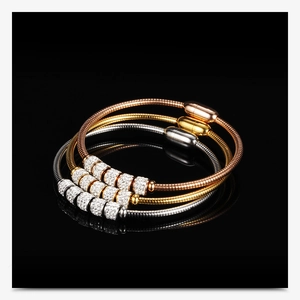 Detailed close-up of 3mm snake bone bracelets with magnet clasps in gold, silver and rose gold