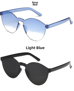 Detail view of colorful rimless one-piece sunglasses with transparent candy color temples