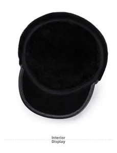 Detailed view of the warm thick faux fur lining and leather brim of the men's winter hat
