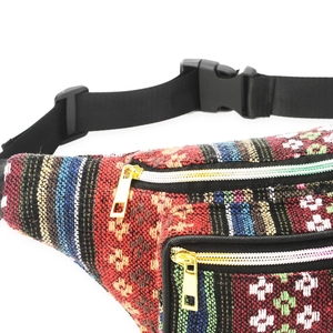Ethnic bohemian fanny pack with colorful woven patterns and gold zipper detail