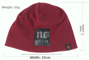 Detail view of burgundy fleece beanie with dimensions 25cm by 20cm and weight of 55g