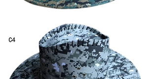 Detailed macro view of the gray digital camo texture and stitching on a cowboy hat