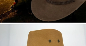 Detail of suede western cowboy hat featuring braided rope trim and metal eyelets