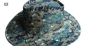 Close-up of digital camo cowboy hat featuring metal eyelets and black stitched brim