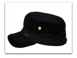 Detail of black military flat cap with plush trim and golden logo plate