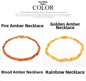 Macro detail of natural Baltic amber baby necklaces in cherry, gold, blood, and rainbow colors