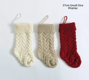 Detailed close-up of 37CM cable knit Christmas stockings in ivory, beige and burgundy